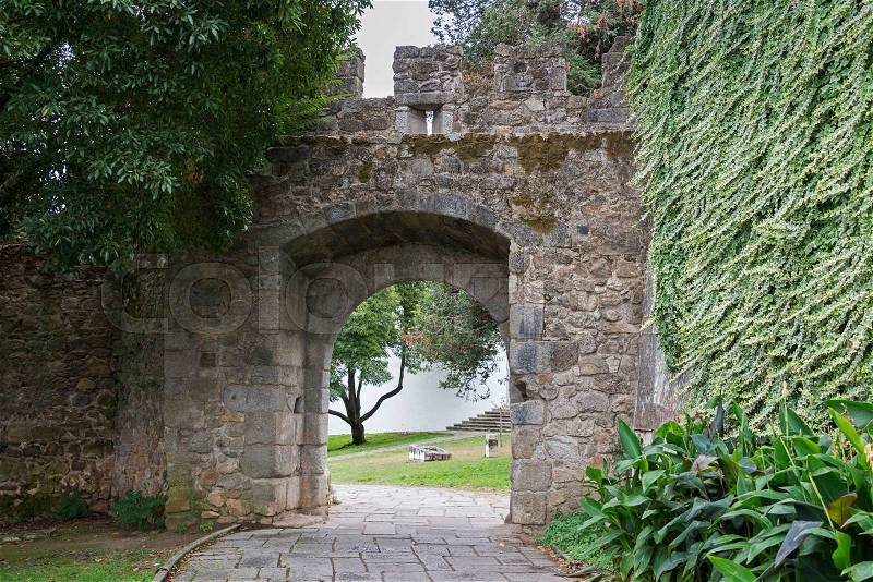 Old entrance gate to the city Evora in alentejo Portugal, stock photo