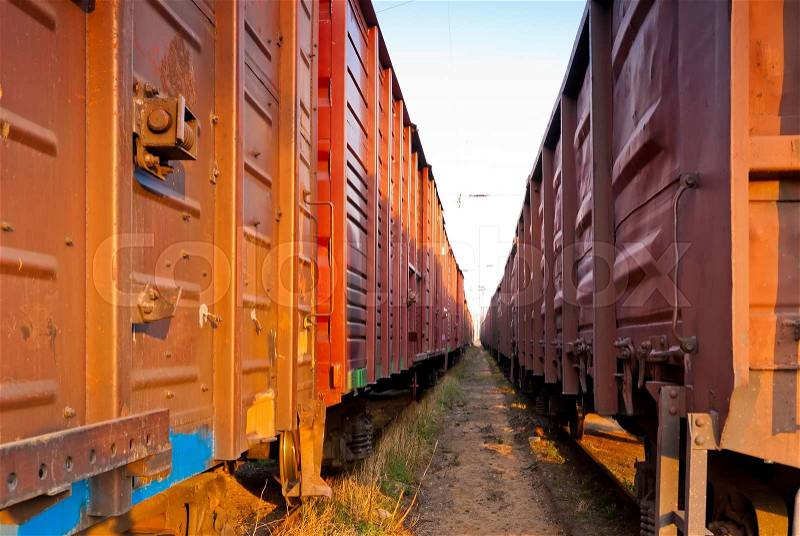 Covered rail wagons for cargo transportation, stock photo