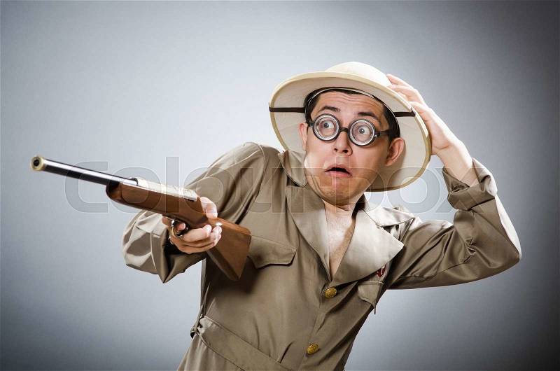 The funny hunter in hunting concept, stock photo