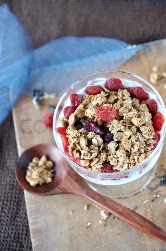 Top view of granola and dried berry bowl, stock photo