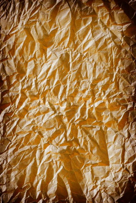 Crumpled brown Paper from a package as background texture, stock photo