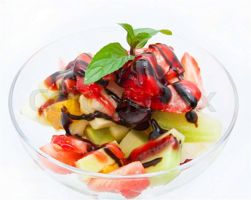 Fruit salad with fresh fruit on a white background, stock photo
