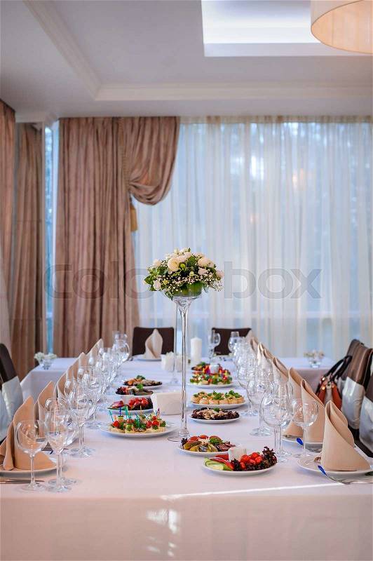 Serving table prepared for event party or wedding, stock photo