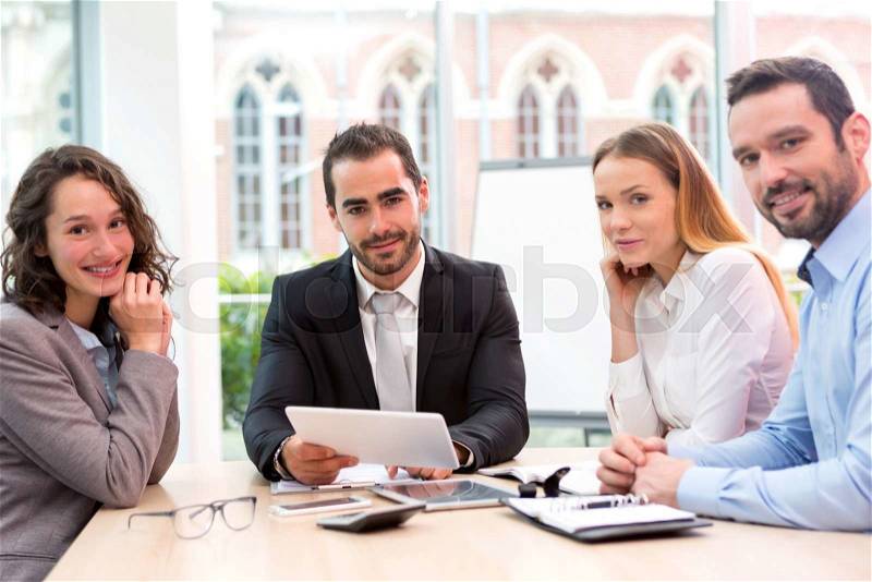 View of a Boss heading a business reunion with partners, stock photo