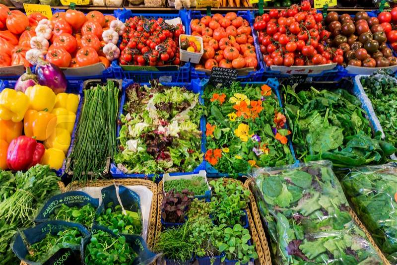 Market with various colorful fresh fruits and vegetables. Farmers market. Fresh vegetables on shelf in supermarket, stock photo