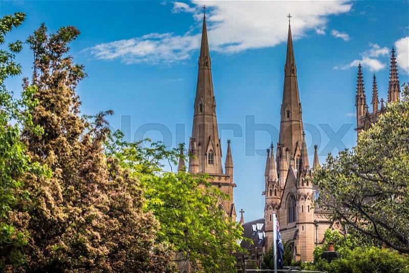 SYDNEY - OCTOBER 27 : St.mary's cathedral church with blue sky in Sydney ,Australia on 27 October2015.St.mary cathedral church is the biggest church in Sydney, stock photo