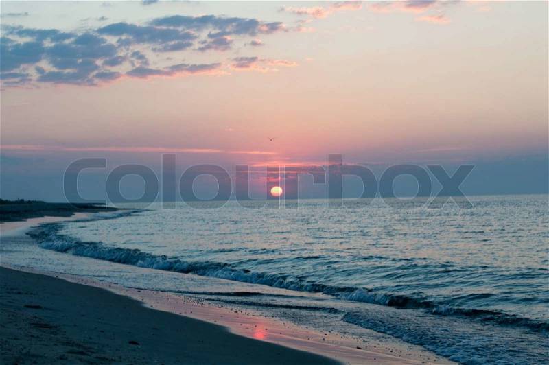 Seascape - sunrise. Sea, sand and sun - the primitive beauty, stock photo