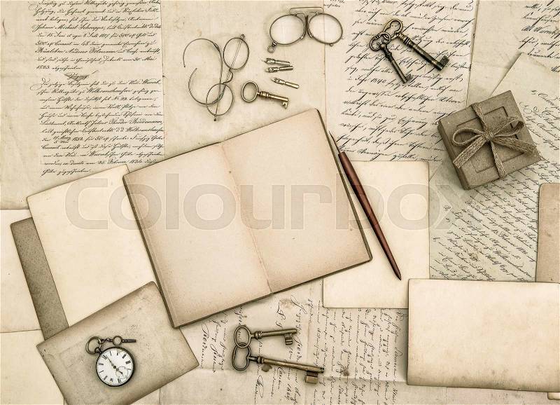 Vintage handwriting and antique office tools. Nostalgic paper background, stock photo