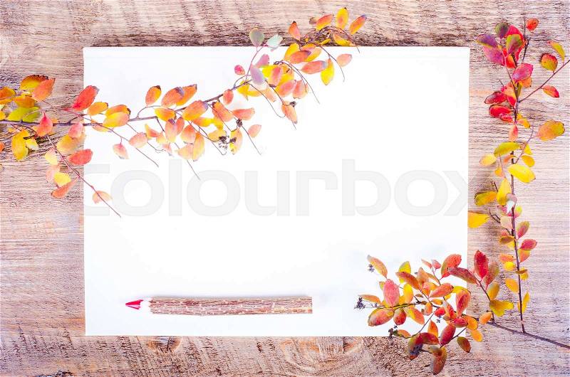 Colorful autumn leaves, envelope and pen lying on diary, notebook. Fall and thanksgiving. Autumn composition. Free space for text, stock photo
