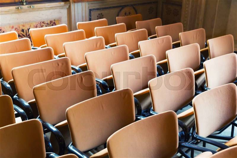 Close up of seats standing in rows in the hall, stock photo