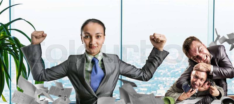 Strong business woman thinking about fighting in the office, stock photo