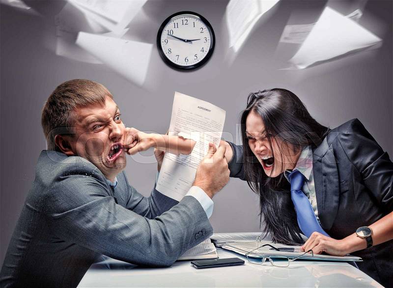 Two office workers starting to fight, stock photo