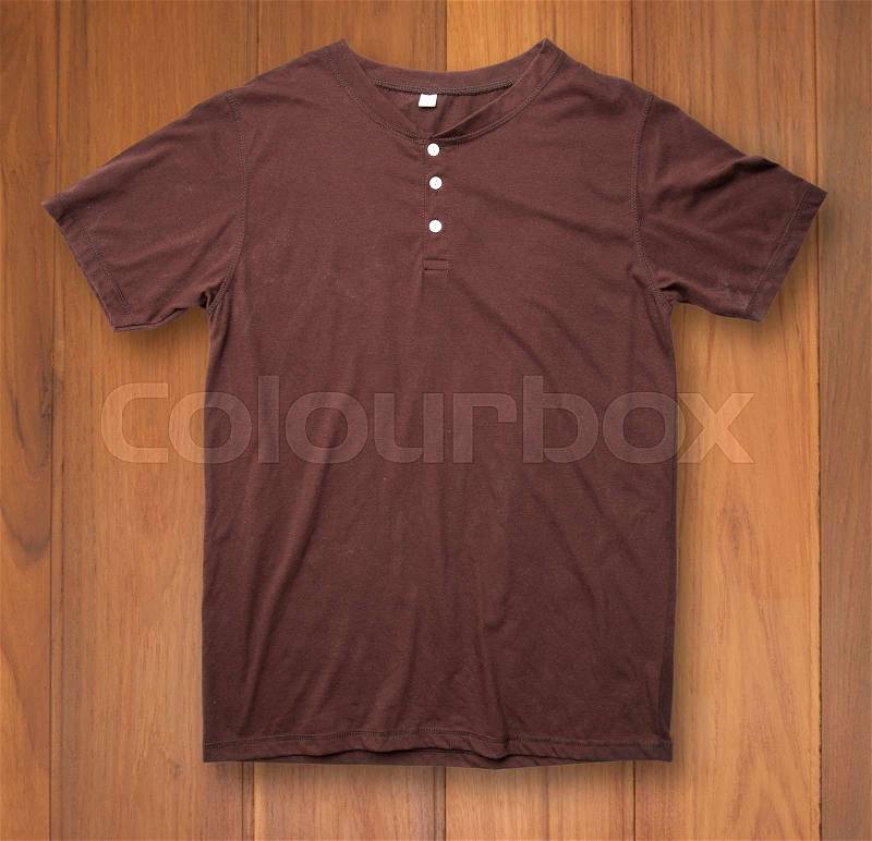 Brown t-shirt on white background, stock photo