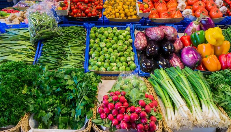 Market with various colorful fresh fruits and vegetables. Farmers market. Fresh vegetables on shelf in supermarket, stock photo