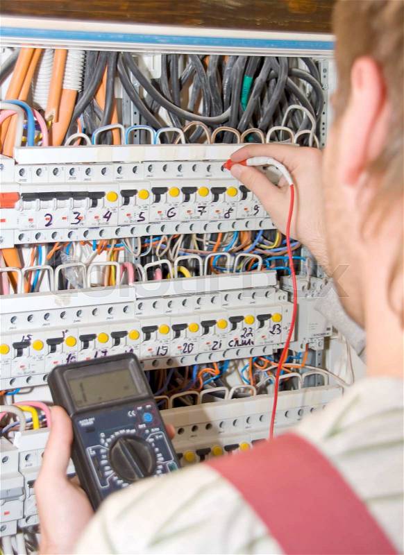 Electrician at work, stock photo