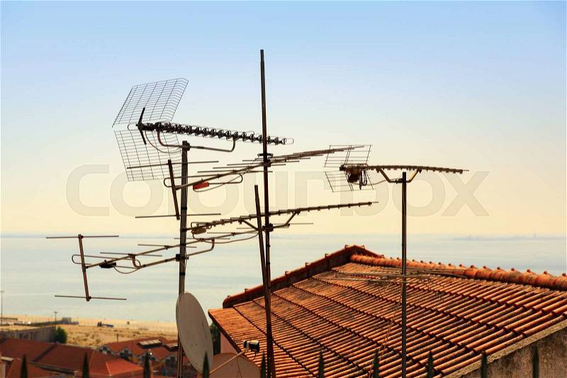 Many antennas and satelites on the roof, Portugal, stock photo