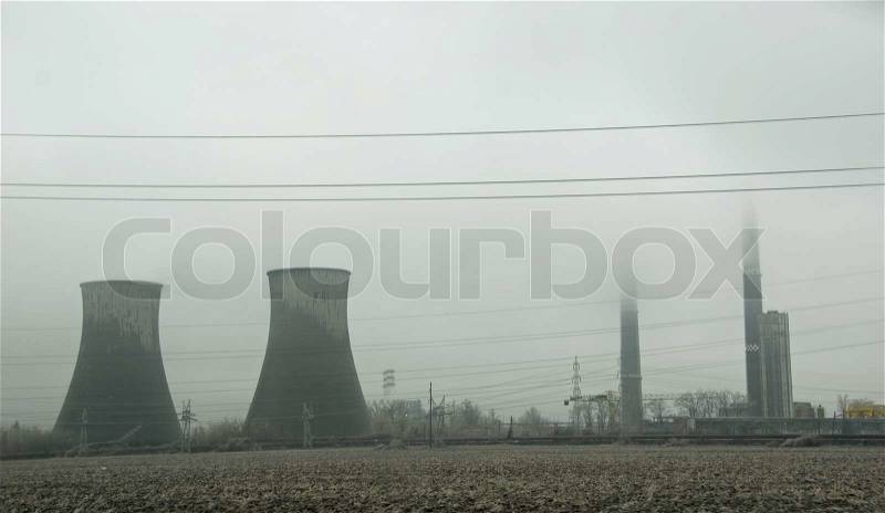 Electric Power Plant outside Bucarest Romania. Cooling towers, stock photo
