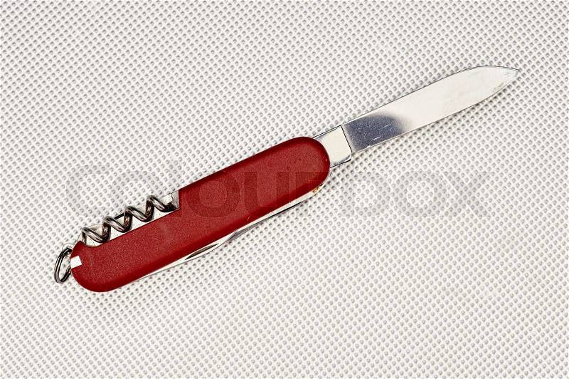A studio photo of a pocket knife, stock photo