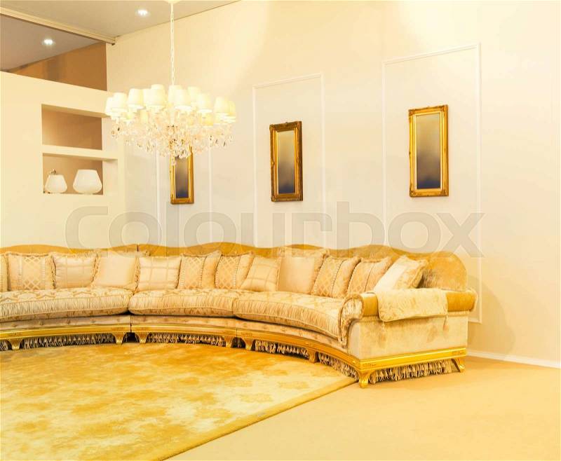 Luxury beige interior with nice big sofa, stock photo