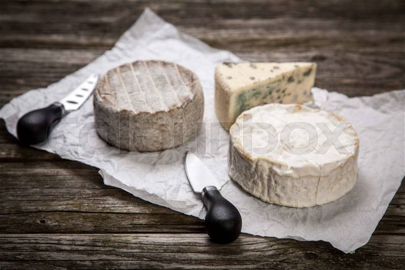 Soft french cheese of camembert and other types, stock photo