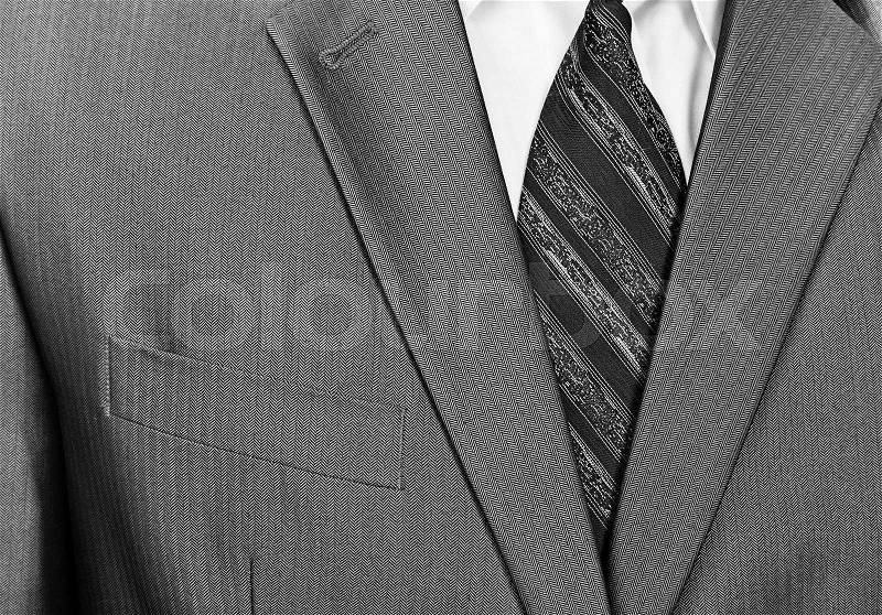 Close-up view of businessman formal wear suit, stock photo