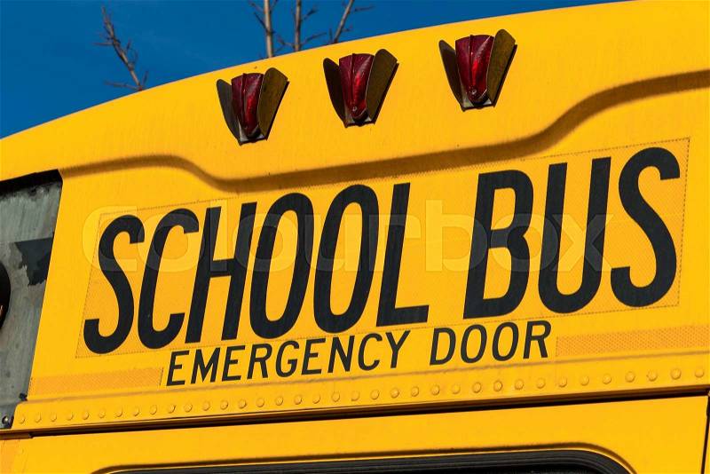 A typical american school bus yellow, stock photo