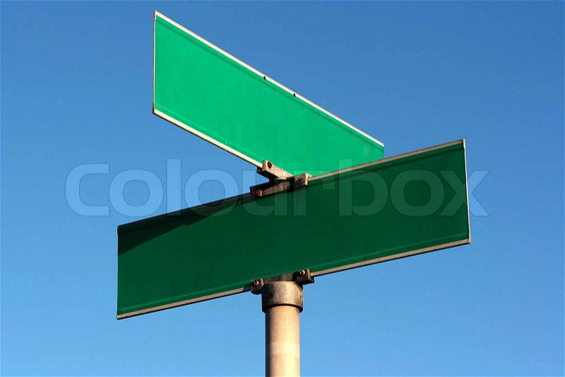 Pure guide sign of crossing of streets against the blue sky, stock photo