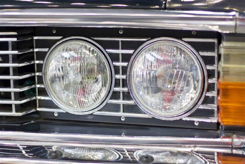 Retro car double headlight, stock photo