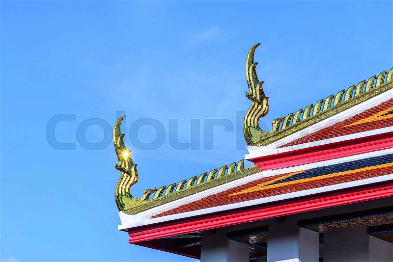 Beautiful gable apex on the roof of buddhist temple, stock photo
