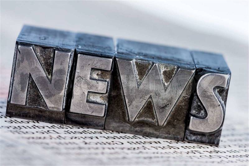 The word news written with lead letters. photo icon for newsletters, newspapers and information, stock photo