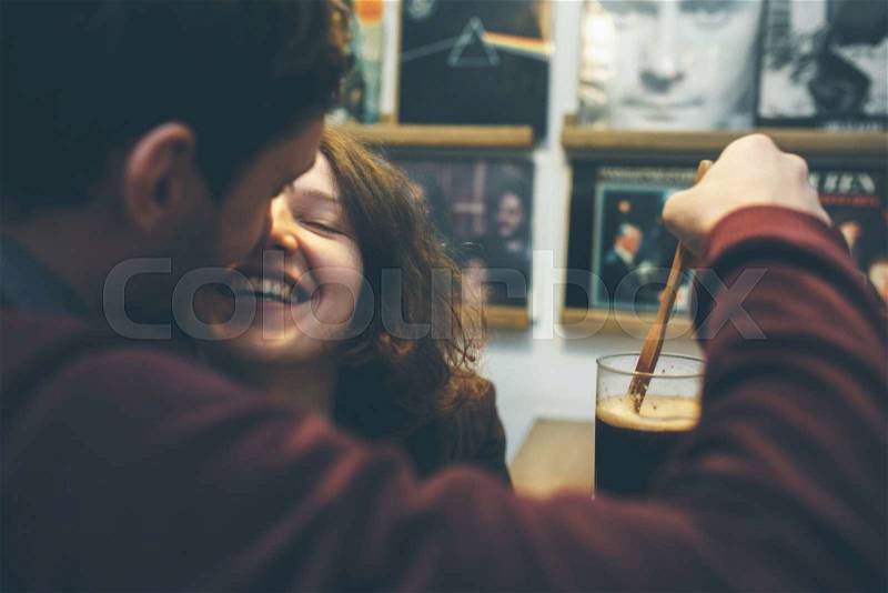 Vintage couple preparing coffee with vacuum coffee maker, stock photo
