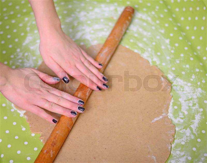 Woman hand prepare dough for cookies, stock photo