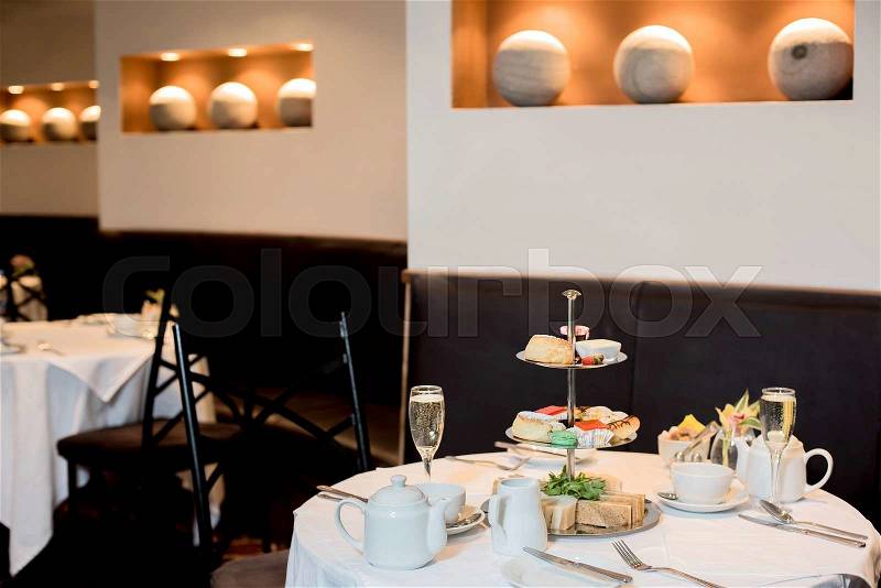 Reserved restaurant tables, well arranged, stock photo