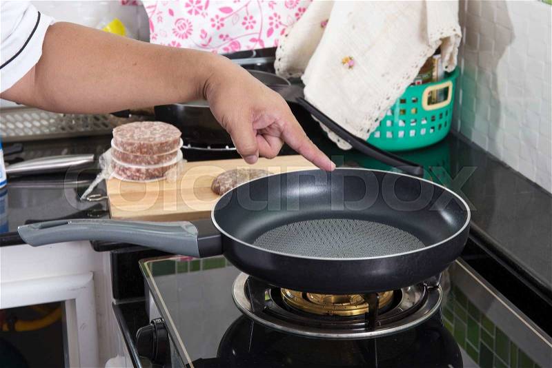 Chef prepared cooking Beef burger in the pan / cooking Hamburger concept, stock photo