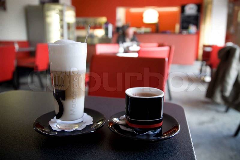 Breakfast In One Of City Cafe. Cups Of Coffee And Cake, stock photo
