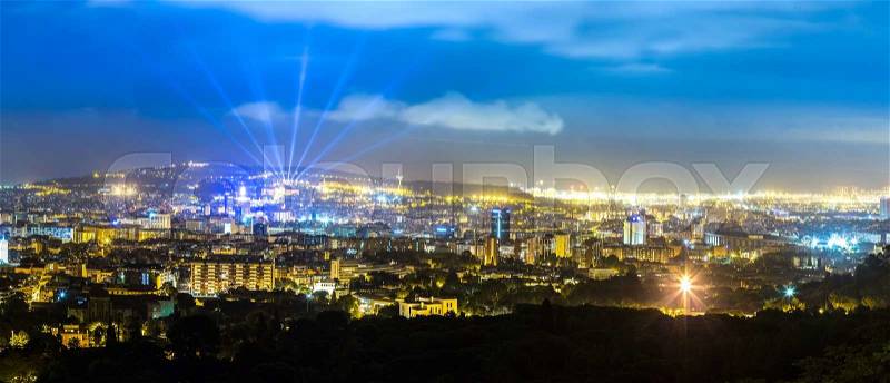 Panoramic view of Barcelona in a summer night in Spain, stock photo