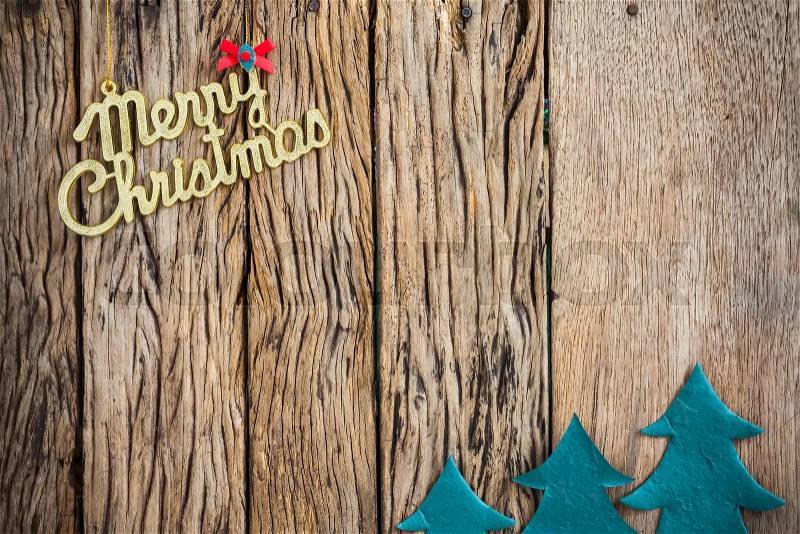Old grunge wooden board with Christmas border, stock photo