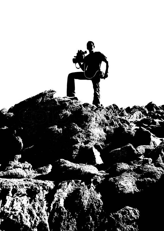 Cameraman black silhouette standing on rocky hill outdoor, stock photo