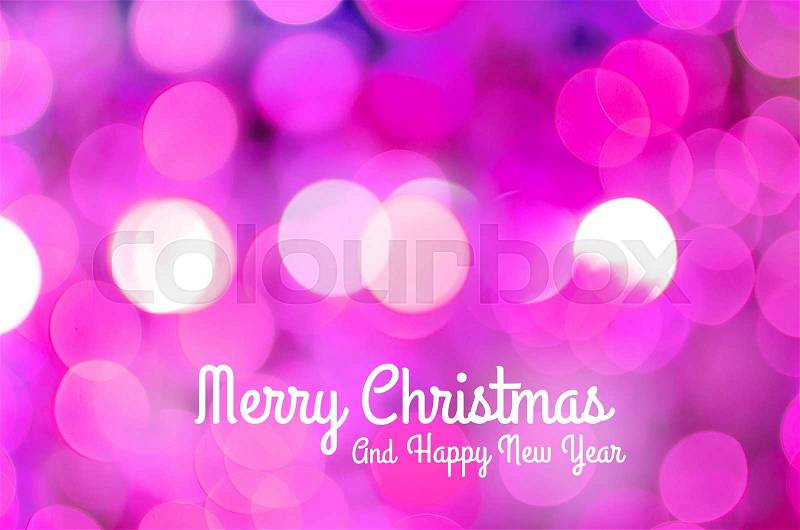 Night light Pink bright bokeh background with text merry christmas and happy new year, stock photo