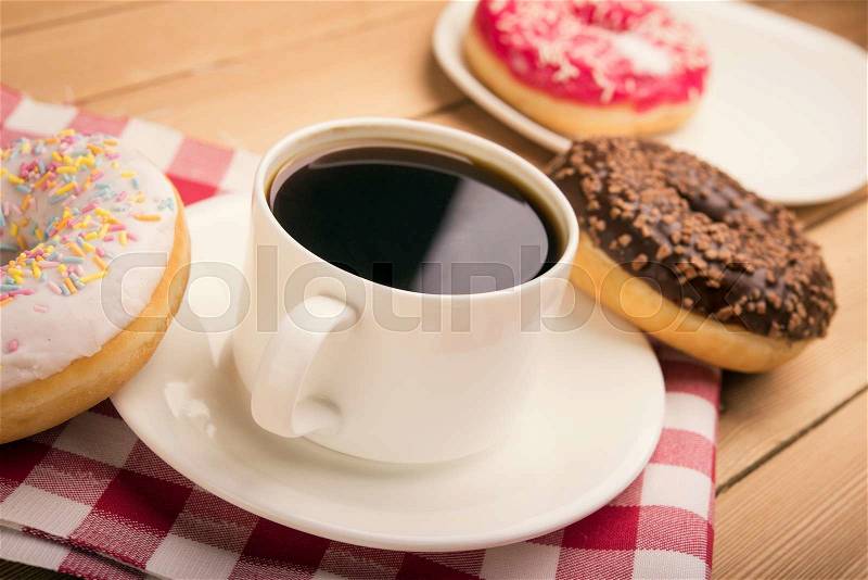 Breakfast of coffee and donuts, stock photo
