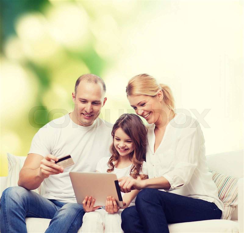Family, shopping, technology and people - smiling mother, father and little girl with tablet pc computer and credit card over green background, stock photo