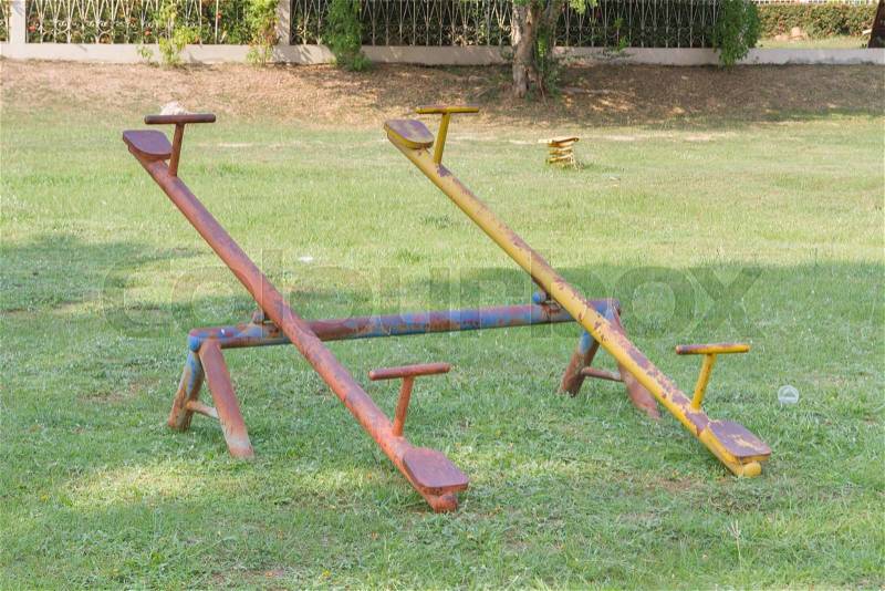 Old see-saw in the old playground, stock photo