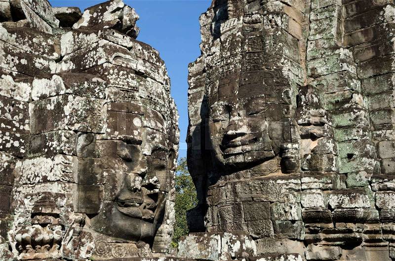 Faces of Bayon temple in Angkor Thom, Siemreap, Cambodia, stock photo