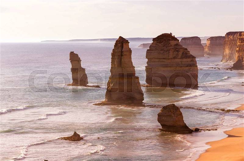 Beautiful sunset view at coast of Twelve Apostles by Great Ocean Rd, Australia, stock photo