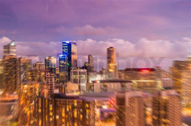 Blurred image of Metropolis night skyline, stock photo