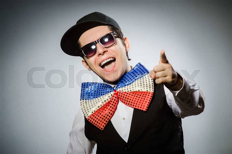 Funny man with giant bow tie, stock photo