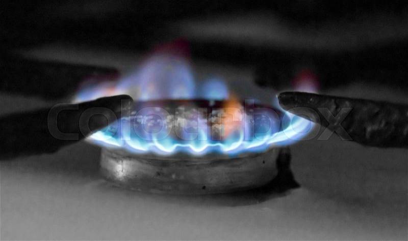 Gas burner on stove. Selective focus, stock photo