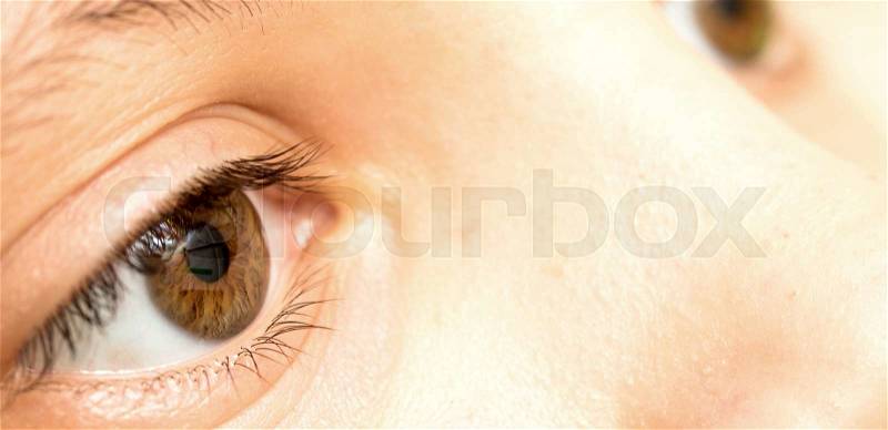 Close up view of a brown eye - no make up on, stock photo