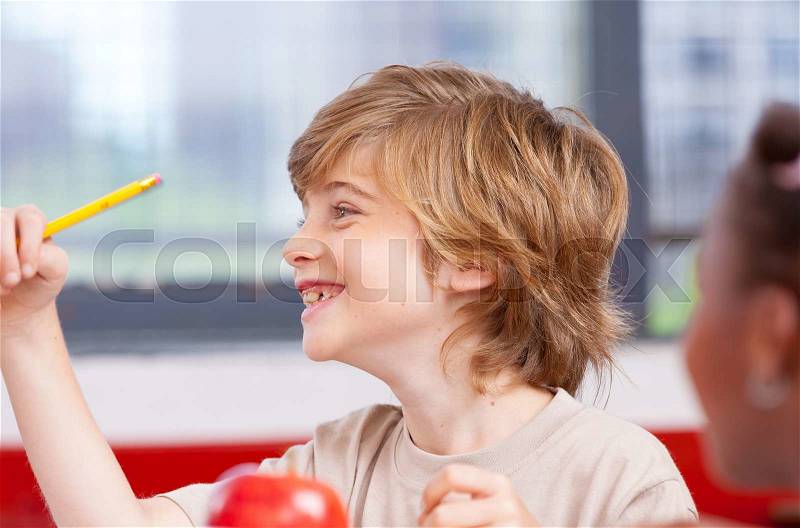 Smiling american boy at primary school, stock photo