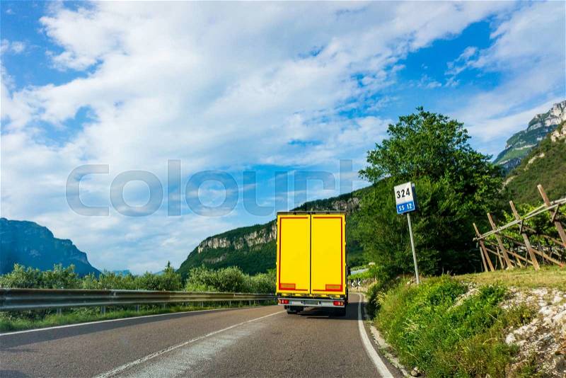 Cargo truck on the mountain. truck on road. Cargo transportation, stock photo